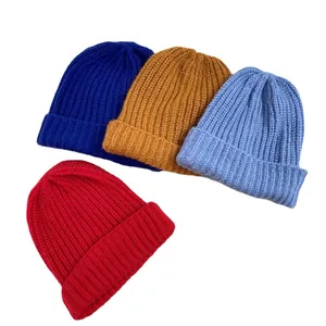Chunky knit beanies in vibrant colors for autumn and winter, oversized cozy style