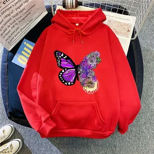 Casual red oversized hoodie featuring a large butterfly and floral graphic print on the front
