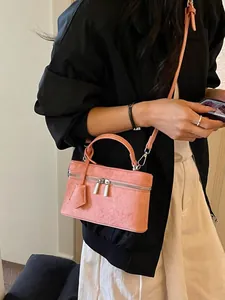 Elegant small pink box handbag for women, fashion summer vanity crossbody bag styled on model