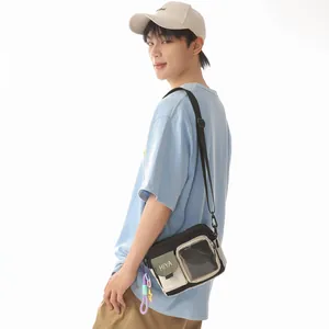 Detailed side view of a stylish casual crossbody bag worn by an Asian male model.