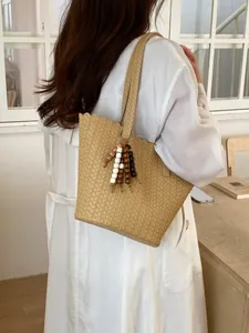 Woven retro bucket bag with wooden bead charms, large capacity for summer fashion
