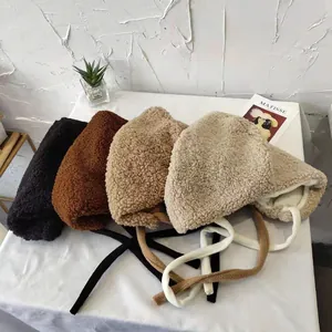 Women's Japanese style sherpa earflap hats shown in black, brown, tan, and beige