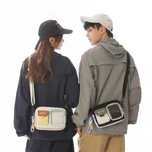 Detailed view of the casual lightweight crossbody bags shown on male and female models.