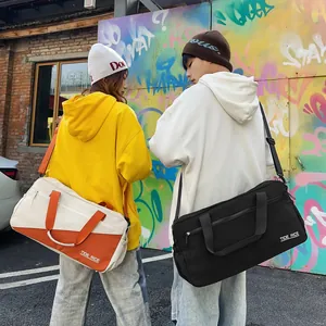 Trendy street style gym bags for women in black and orange white contrast