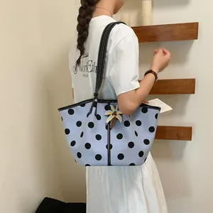 Light blue polka dot tote bag for women with palm tree charm details