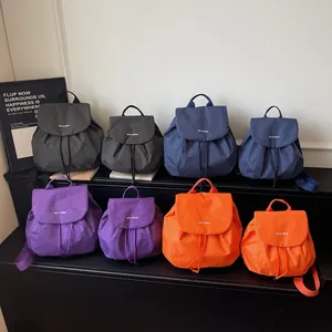 Checkered mini backpacks for women displayed in multiple vibrant colors and two sizes