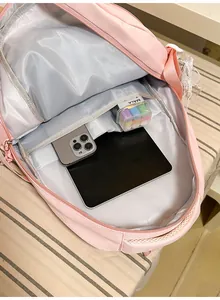 Interior view showing large capacity and compartments of a pink school backpack