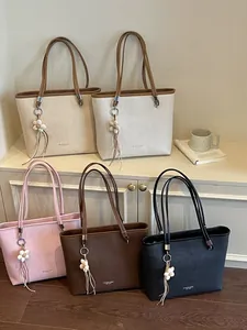 Set of large capacity commuter tote bags in multiple colors with flower charms