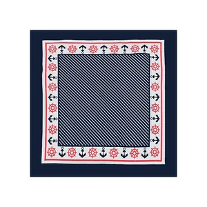 Nautical cotton bandana with anchor and ship wheel patterns in navy and red colors.
