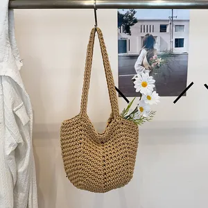Close-up of the woven texture on this stylish niche underarm shoulder bag.