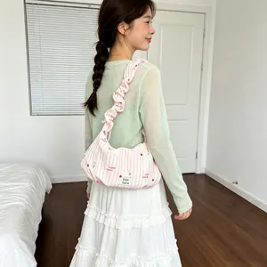 Large capacity pink striped dumpling bag with ruffled strap and cute cat pattern