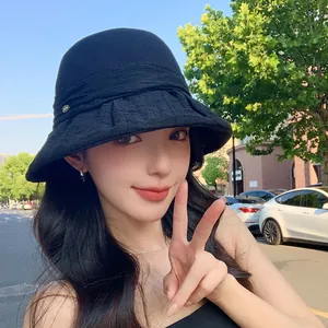 Elegant breathable black sun hat for women with foldable bucket design