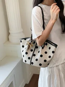 Stylish white tote bag with black polka dots and palm tree charm for women