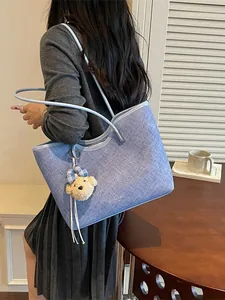 Fashionable large capacity blue textured fabric tote bag for women with cute bear charm