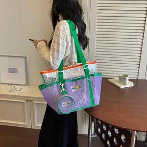 Large purple and green mesh tote bag for women with matching mini round pouch.