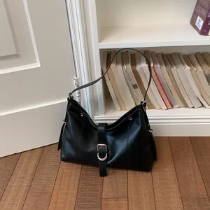 Chic black faux leather underarm bag featuring a stylish silver buckle and D-ring detail
