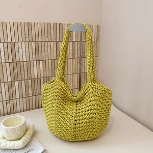 Detailed view of the lime green hand-knitted texture on this stylish shoulder tote bag
