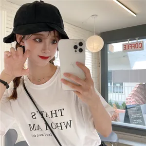 Stylish black Japanese fisherman hat with ruffled pleated brim shown in a mirror selfie