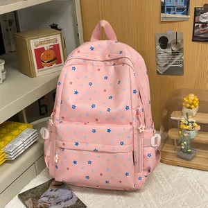 Cute pink star pattern backpack for students featuring large capacity and aesthetic design