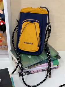 Marineblauer und gelber kleiner Crossbody-Beuteltasche mit Kordelzug und Karos