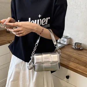 Chic silver metallic woven square underarm bag with chain strap and knot detail