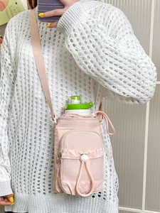 Elegante bolso bandolera rosa para botella de agua con bolsillo de malla para uso casual