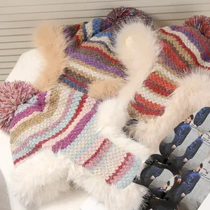 Macro view showing the thick faux fur lining and colorful knitted patterns of these trapper hats
