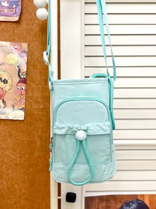 Bolso bandolera ligero de nailon verde menta para mujer con bolsillo frontal de malla