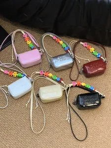 Mini square crossbody bags with colorful alphabet bead straps in multiple fashion colors