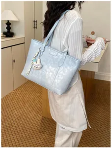 Simple large capacity tote bag for women, stylish PU leather shoulder bag for daily commuting.