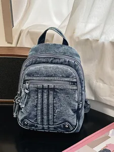 Stylish acid-wash denim backpack featuring three vertical stripes and multiple zipper pockets