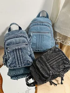 Stylish large capacity denim backpack for women with multiple zippers and washed finish