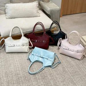 Elegant women's tote bags in five vibrant colors featuring a stylish belt buckle design.