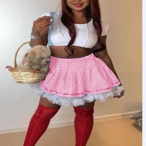 Pink plaid pleated mini skirt for women with white lace trim and puffy underskirt