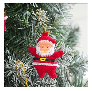 Detailed view of a red flocked Santa Claus ornament hanging on a Christmas tree