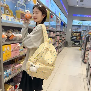 Japanese style yellow star pattern backpack with cute bunny charm for school girls