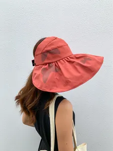 Stylish wide-brimmed orange sun hat with butterfly print for women's summer UV protection