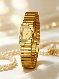 Primer plano del reloj vintage Bee Sister en color oro con esfera geométrica