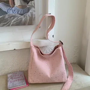 Pink canvas shoulder bag with silver star sequins and wide adjustable strap