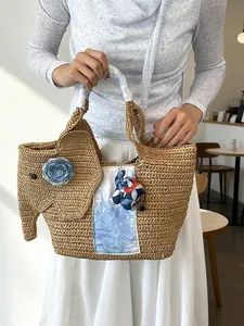 Sac fourre-tout fait main en paille en forme d'éléphant pour les vacances à la plage