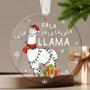 Clear acrylic Christmas ornament with cartoon llama and festive 'Fala la la' text.