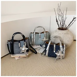 Collection of denim bucket bags with star charms for women's fashion