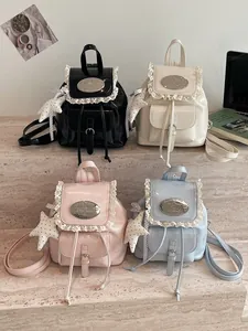 Mini-rugzakken in preppy-stijl met kant en sterbedels verkrijgbaar in vier kleuren