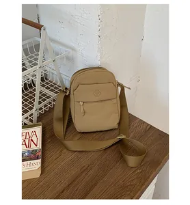 Fashionable khaki nylon mini crossbody bag with adjustable shoulder strap for women