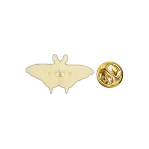 Back view detail of a vintage gold metal moth butterfly brooch showing the pin and clasp