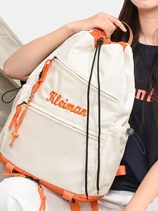 Sac à Dos en Nylon pour Femmes avec Cordon de Serrage Conception de Niche Imperméable Sac à Dos de Voyage avec Broderie Orange Gris Noir