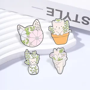 Macro detail of cute cartoon cat and plant enamel pins set with floral forest themes.