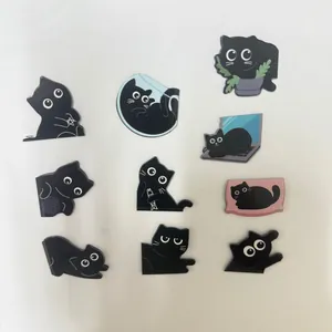 Set of ten creative black cat magnetic bookmarks featuring various cute cartoon feline poses