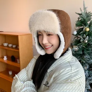 Stylish brown winter trapper hat with thick white faux fur lining and warm ear flaps