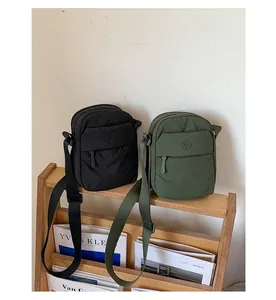 Minimalist small nylon crossbody bags for women in black and olive green colors